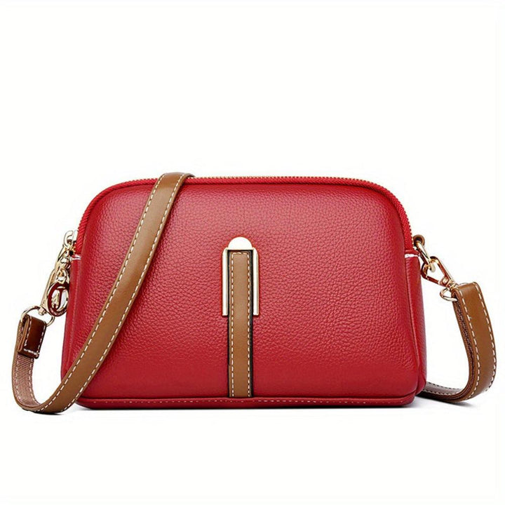 MILA EMBOSSED CROSSBODY BAG