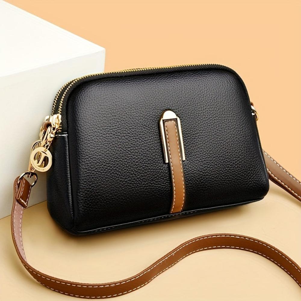 MILA EMBOSSED CROSSBODY BAG