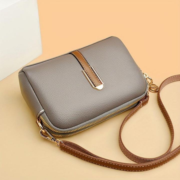 MILA EMBOSSED CROSSBODY BAG