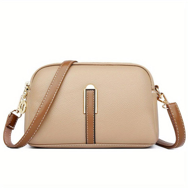 MILA EMBOSSED CROSSBODY BAG